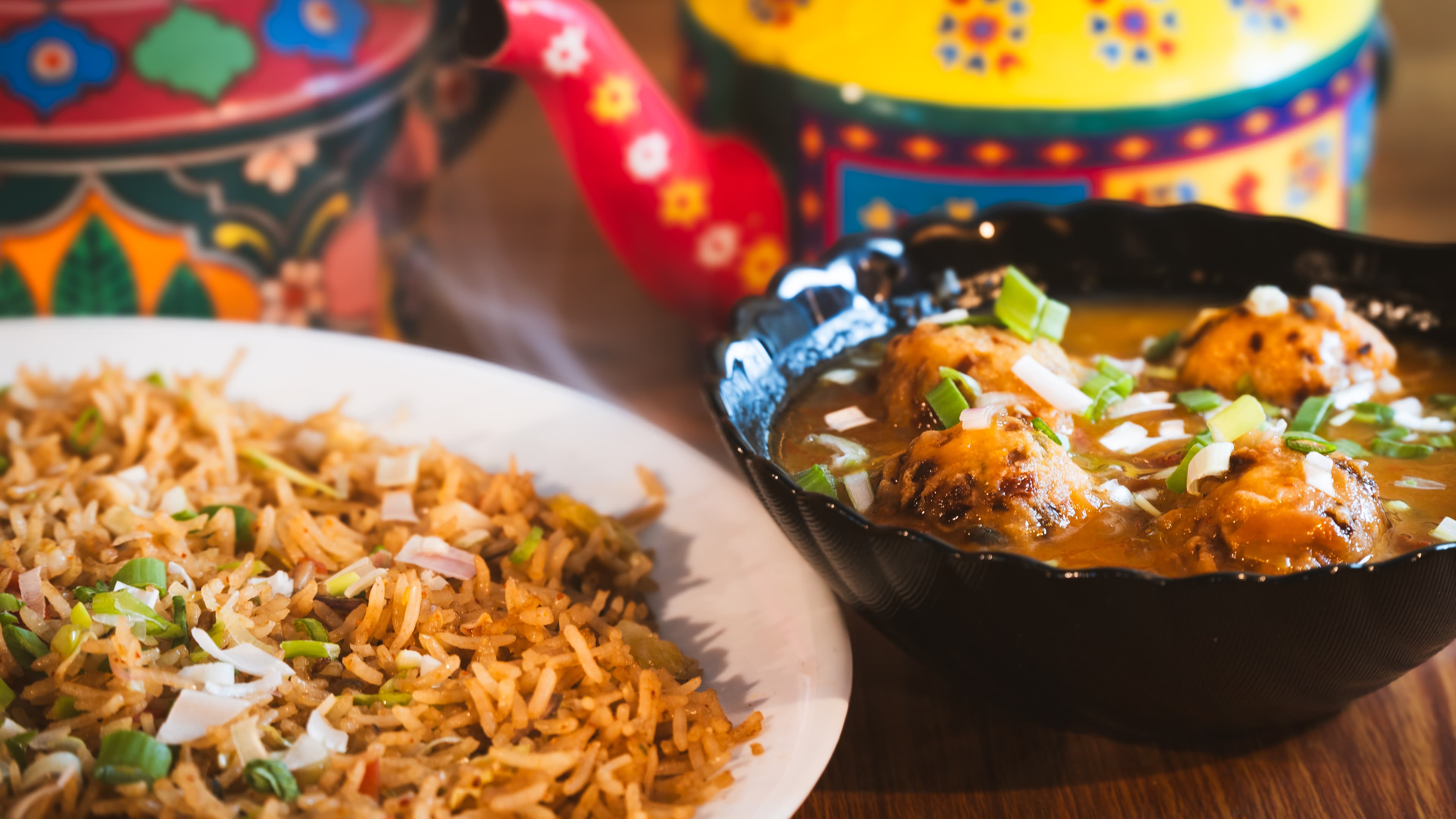 Spiced fried rice with vegetable manchurian gravy